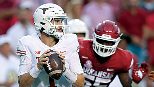 Texas QB Hudson Card against Arkansas.